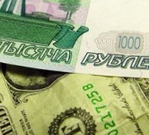 Рубль укрепился на 70 копеек